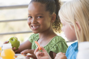 girl eating apple