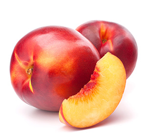 Yellow nectarines, whole and sliced