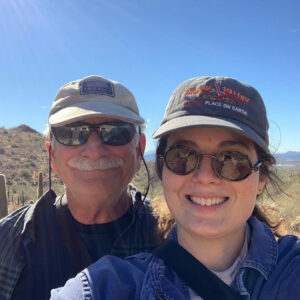 Smiling father and daughter